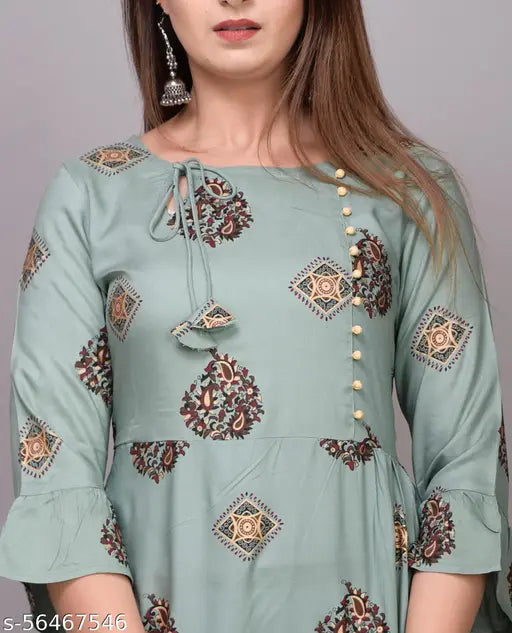 Mint green prinred cotton kurti, three-quarter sleeve, printed combo. Refresh ethnic wardrobe with Dimple Exports kurta on Gillkart
