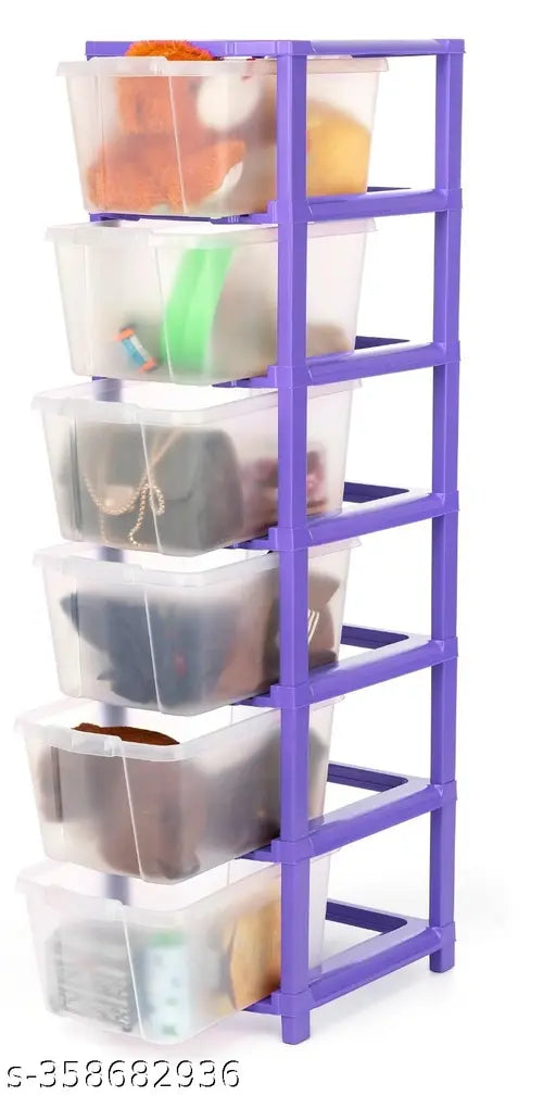 Purple storage system with multiple clear plastic drawers containing various items like toys, books, clothes and shoes