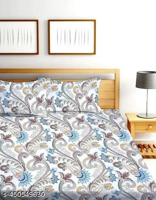 Premium quality cotton blend fitted bedsheet with ethnic motifs, ideal for adult summer use. Soft, breathable, and comfortable." (92 characters)