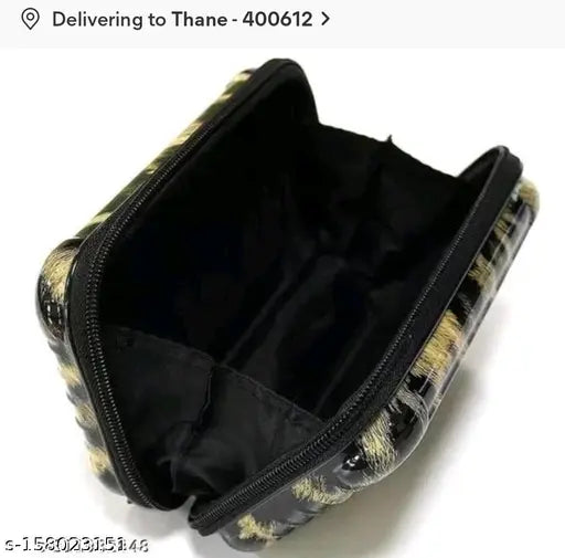 Black and yellow snakeskin patterned wallet with a zip closure