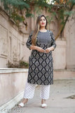 Rayon embroidered straight kurta with palazzo in printed net design, three-quarter sleeves - Women's fashion from India