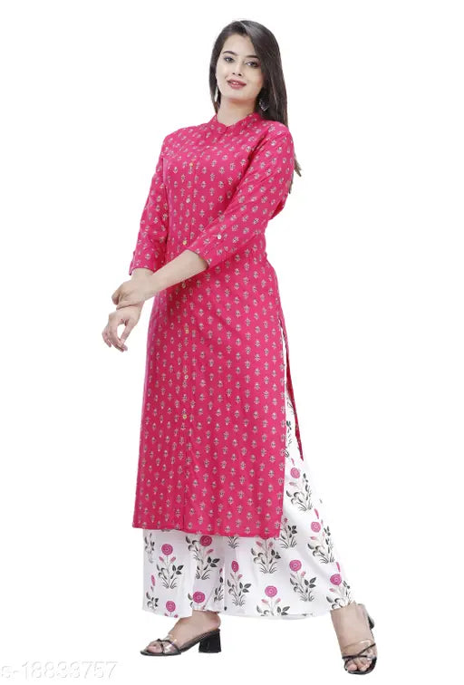 Trendy petite women's rayon kurta sets with palazzos, three-quarter sleeves, printed net design. Single to XXXL sizes available. Indian origin