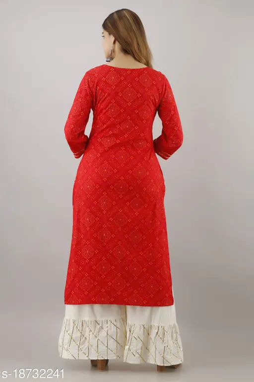 Long red embroidered women's kurta with dupatta and sharara design