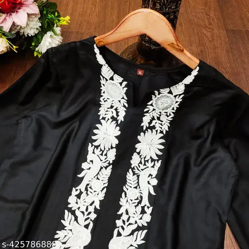 Black rayon top and bottom with intricate embroidery detail, ideal for casual or dressy occasions