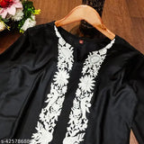 Black rayon top and bottom with intricate embroidery detail, ideal for casual or dressy occasions