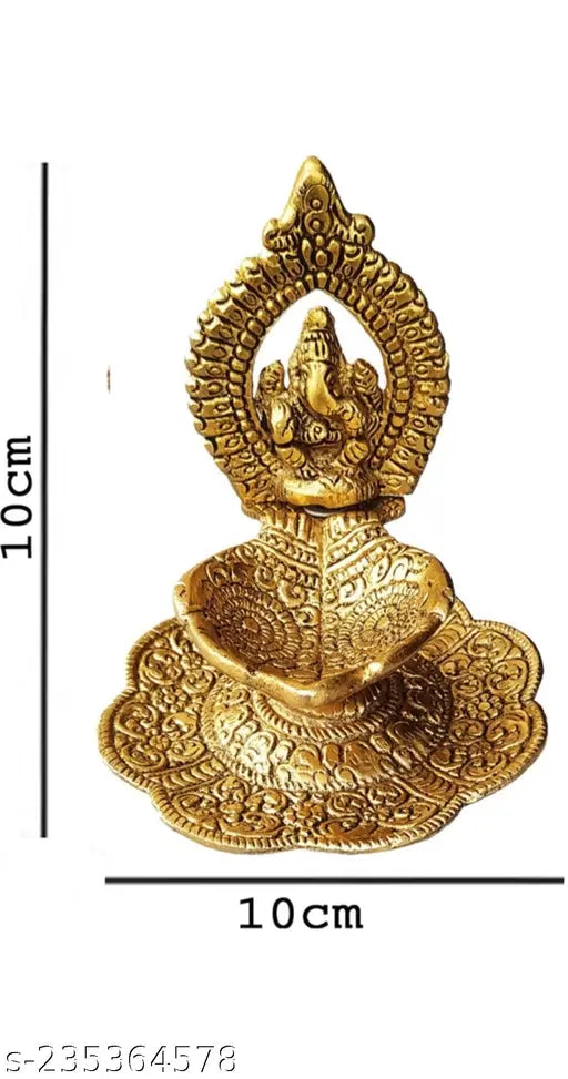 Metal Ganesh hath diya for home, temple, office decoration and gifting, symbolizing luck, love, happiness, and prosperity. Dimensions: L-10cm B-10cm H-10cm. Diya originates from India