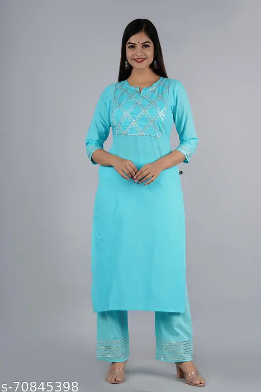 Pink solid cotton kurta and palazzo set, modern Indian ethnic wear with three-quarter sleeves, ideal for any occasion from Style N Selfie