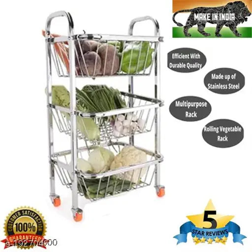 A stainless steel kitchen trolley with three stackable shelves, each carrying a variety of fresh fruits and vegetables