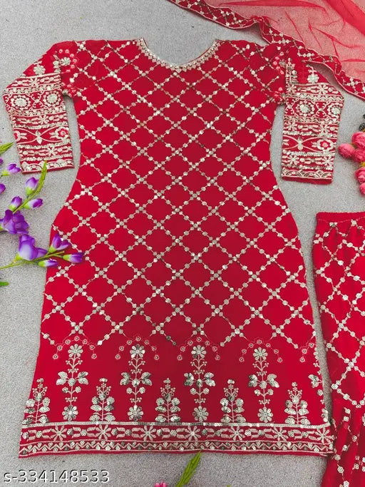 A red traditional dupatta set with an embroidered designer party wear kurta and sharara, paired with a matching scarf