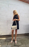 White pearl crossbody purse
