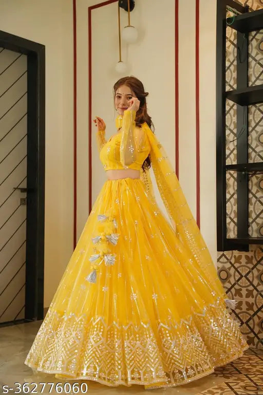 Embroidered net lehenga ensemble (semi-stitched, unstitched, free size) from India