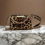 Animal print purse with gold chain accent