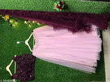 Pink jute-silk net lehenga choli with embellished top and ruffled dupatta, semi-stitched, free size (36" waist, 42" length)