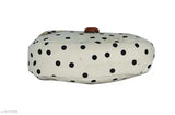 This is a single-line description of the image: "Black polka dot slingbag with adjustable strap, suitable for women's casual outings