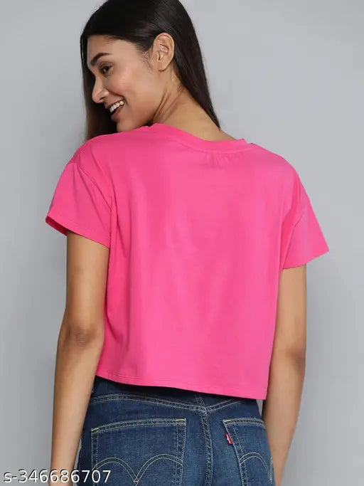 Affordable pink peach printed cotton t-shirt for women, short sleeves on display
