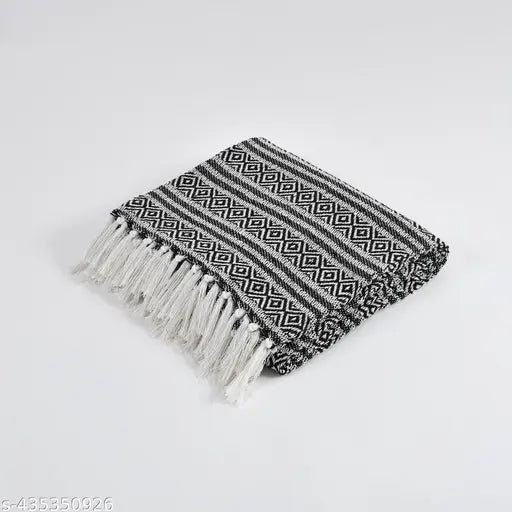 Woven black and white throw blanket, cotton material, various uses on sofa or bed, size 130x180 cm, CMS compatible, versatile home decor