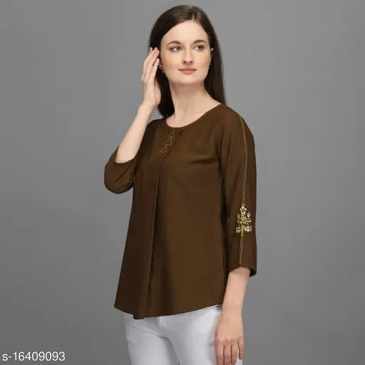 Green embroidered polyester western top with three-quarter sleeves, women's fashion from India