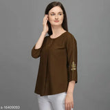 Green embroidered polyester western top with three-quarter sleeves, women's fashion from India