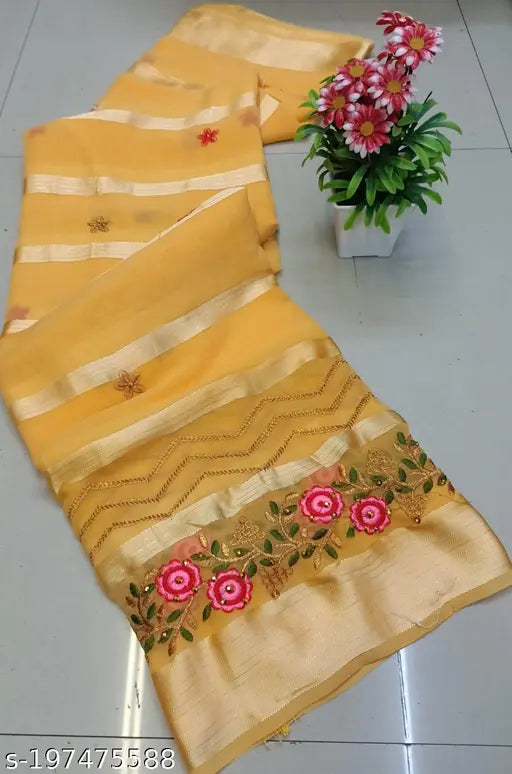 Cream saree with gold border and floral embroidery