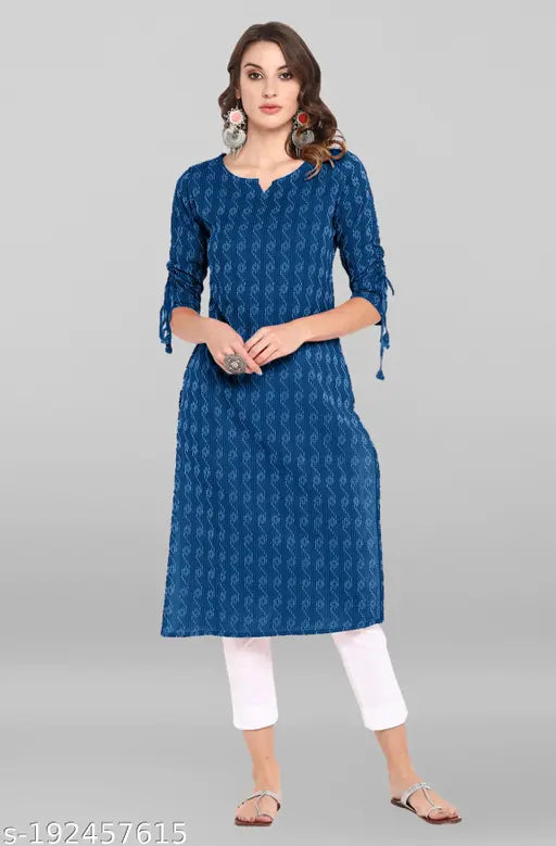 Women's blue kurta set with long sleeves, side pockets, and fringe details