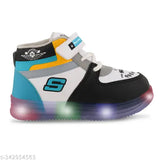 Black, white, and blue light-up casual sports shoes with Velcro closure for little kids, featuring a green logo