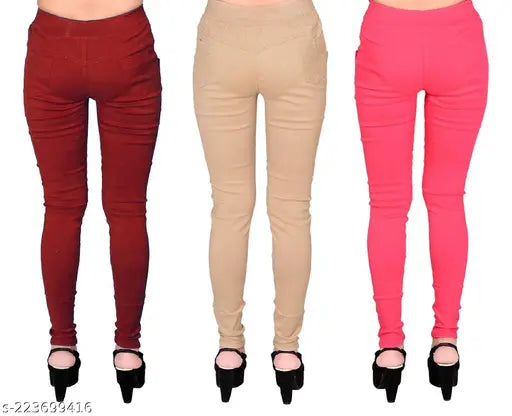 Maroon stretchable Lycra jeggings pack of 3, featuring cotton blend solid design. Women's fashion essential for trendy looks, with pockets and sizes ranging from 28-36 inches. Made in India