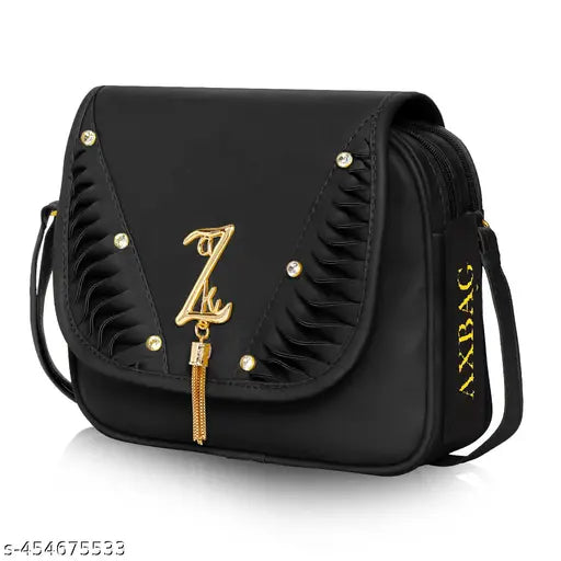 Black party sling bag with adjustable strap, gold zipper, white stitching, crossbody design