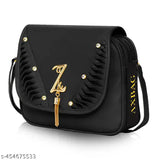Black party sling bag with adjustable strap, gold zipper, white stitching, crossbody design