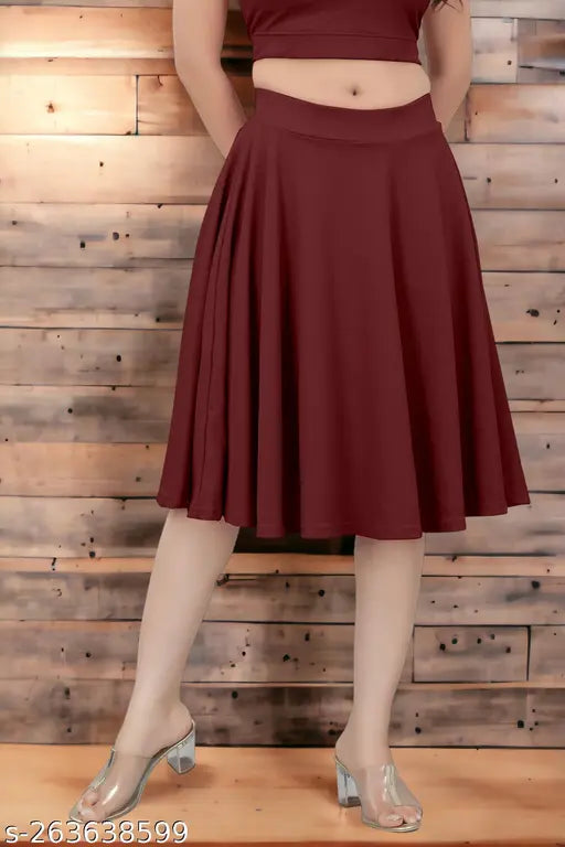 A woman wearing a maroon, flared mini skirt with no sleeves