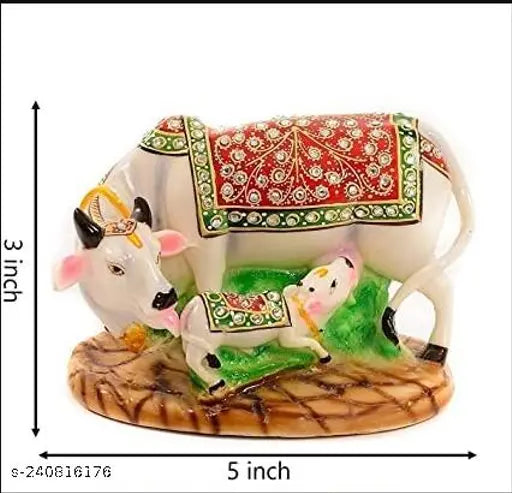 Multicolor handcrafted Polyresin Kamdhenu Cow and Calf statue for home decor or festive gifting, symbolizing prosperity and love