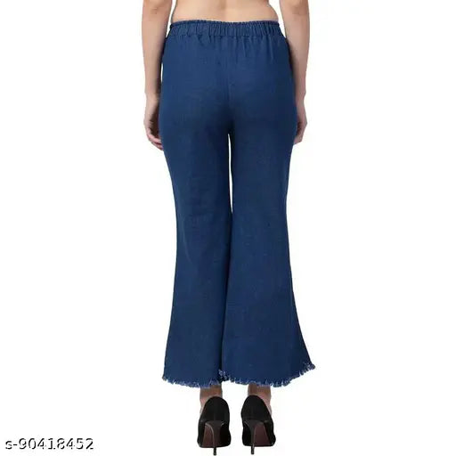 Exclusive blue flared denim jogger jeans for girls & women, studded net detail, elastic drawstring, 4-way stretchable, eco-friendly fabric, suitable for casual wear and formals. Made in India