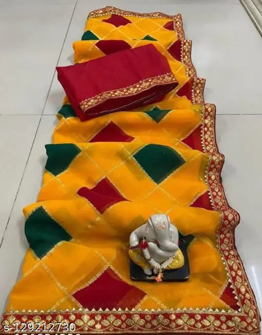 Yellow and red bandhani saree with matching blouse on display
