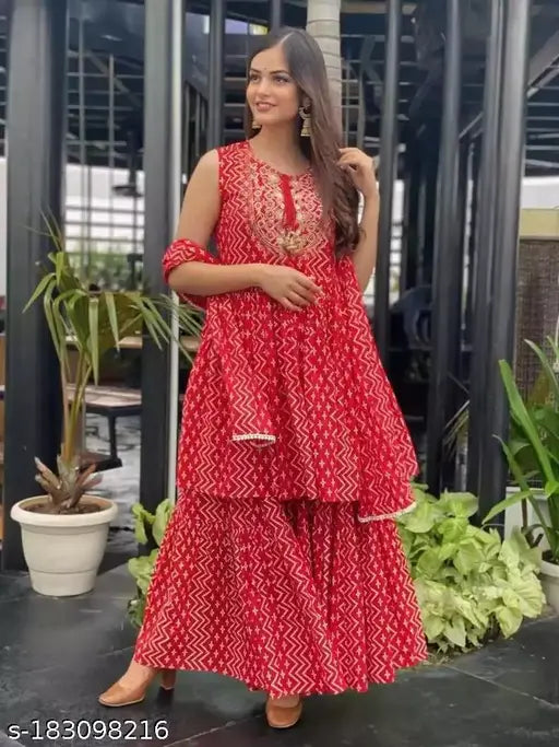 Elegant red anarkali kurta with dupatta set for women - Printed, full-length kameez with matching dupatta. Ethnic design on mid-length tunic, sharrara hemline