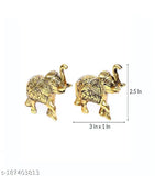 Golden finish metal elephant pair, decorative showpiece from the Chandra Art Collection (India), dimensions: 75cm x 625cm x 25cm