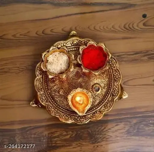 Metal puja thali small with 3 diya for home, temple, office decoration and gifting. Antique gold-polished, floral design, Swastik engraved. Size: 10x10x6 cm (L-B-H)