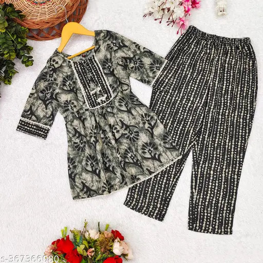 Sky Blue Printed Cotton Ethnic Set for Girls, A-line trousers and top with 3/4 sleeves, round border lace detail. Sizes: 4-5 years, 5-6 years, 8-9 years, 6-7 years, etc. Indian handcrafted cotton fashion