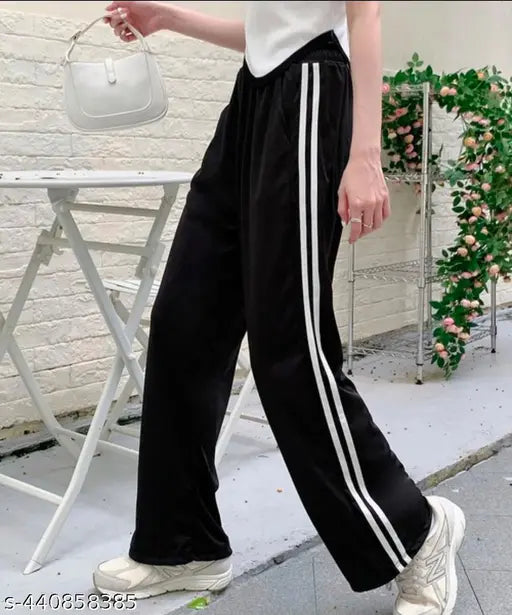 Black high-waist pants with white stripes