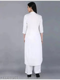 White rayon Women's modern kurta with rayon Palazzos, three-quarter sleeves, trendy ethnic set for special occasions. Available in M, L, XL, XXL sizes. Indian origin