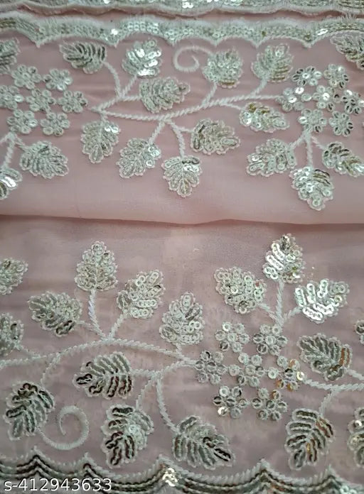Pink sequined sari with white thread embroidery