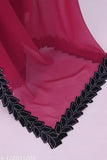 A vivid red party wear saree featuring a heavy, embroidered design with lace trim in the title 'Cherry