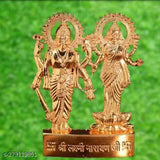 Shiny brass metal deity idol with Lord Ganesha and Goddess Lakshmi
