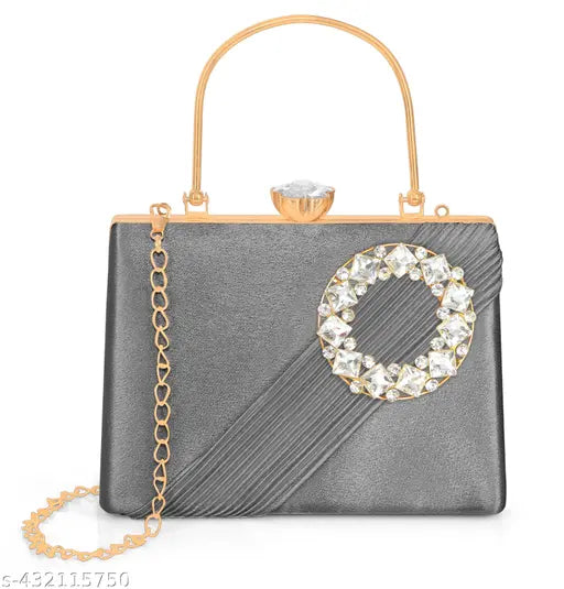 A designer evening handbag with a diamond frame, featuring a round embellishment and gold chain straps