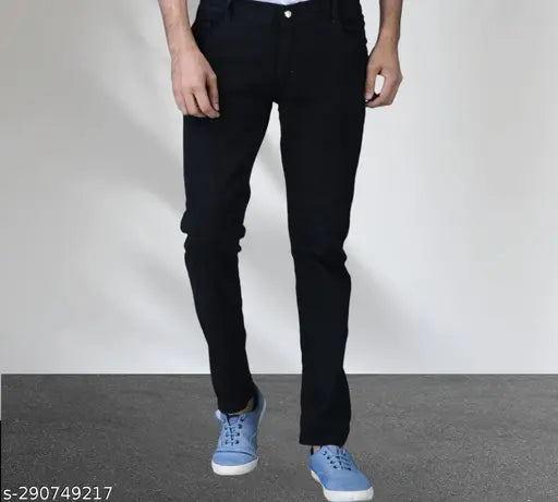Black stretchable solid plain regular jeans from Stitch Factory, made with soft and breathable polycotton fabric. Comfortable fit suitable for daily wear and long-lasting use with anti-corrosive buttons. Stretchable for ease during activities. Size 28 (waist 28in, length 40in), also available in sizes 30 and 32. Made in India