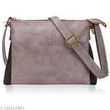 Grey sling bag with adjustable strap and metal hardware