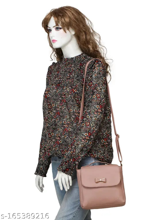Colorful patterned sweater with faux leather purse
