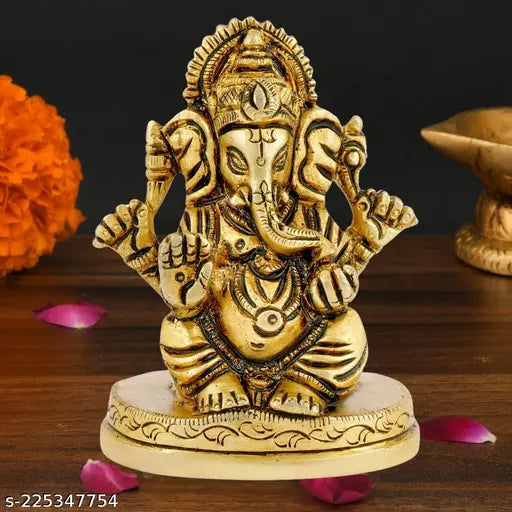 Handcrafted antique finish brass Ganesha idol sitting 32 inches high, with a height of 360gm