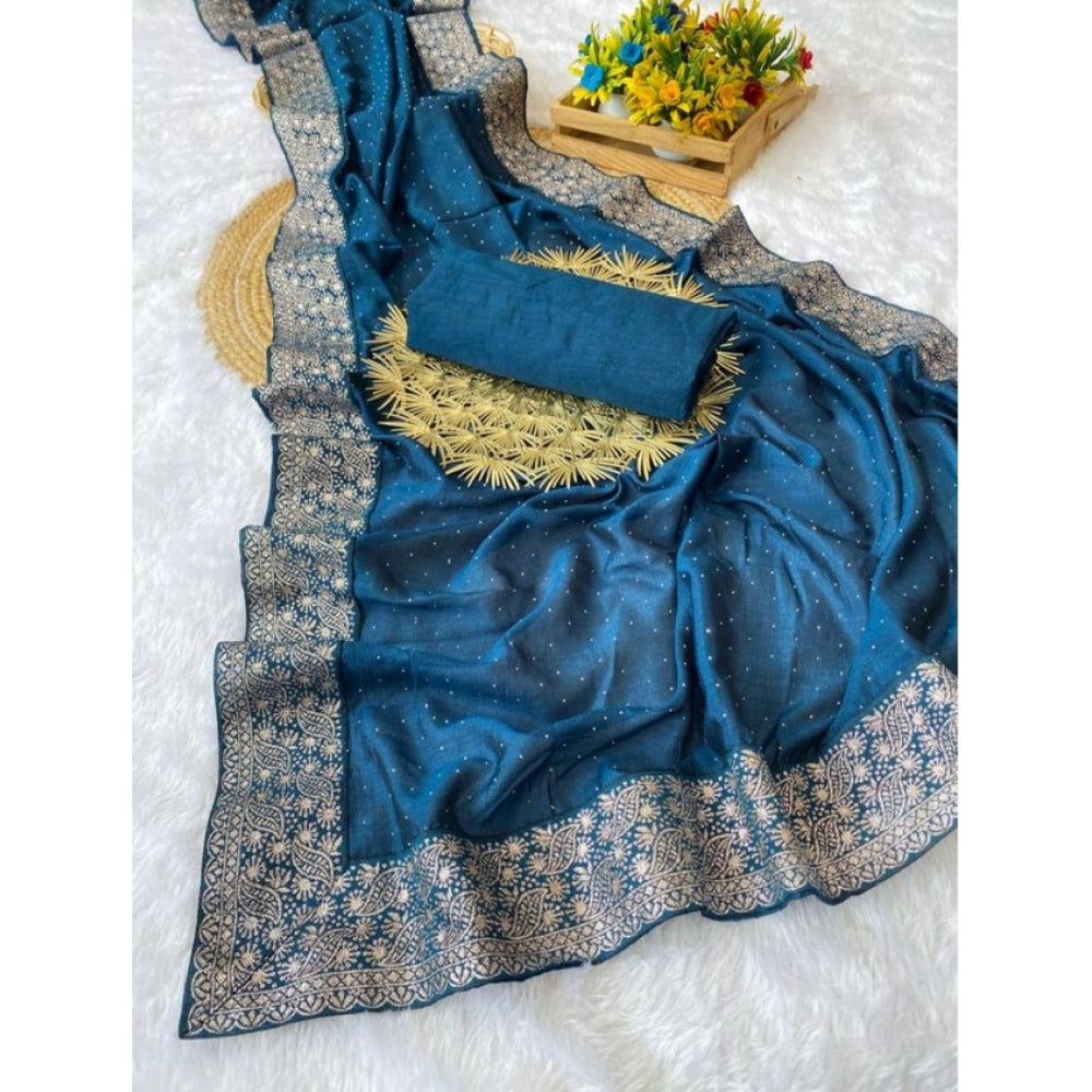Light green silk embroidered saree with unstitched blouse, intricate patterns for traditional Indian wear