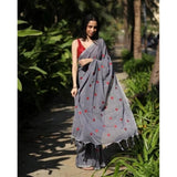 Grey linen printed saree with unstitched blouse, vibrant pattern detail on display