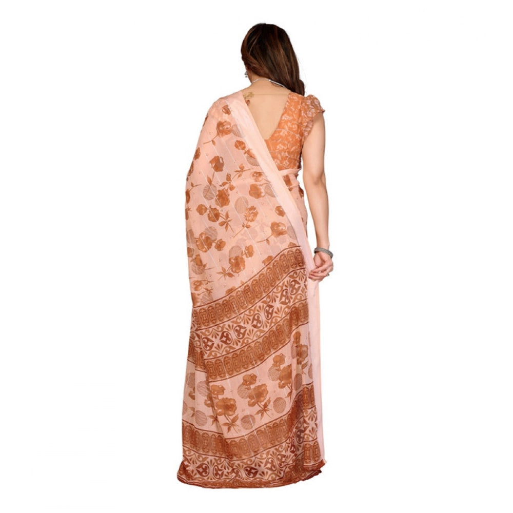 Brown georgette printed saree with unstitched blouse, vibrant floral pattern on display rack
