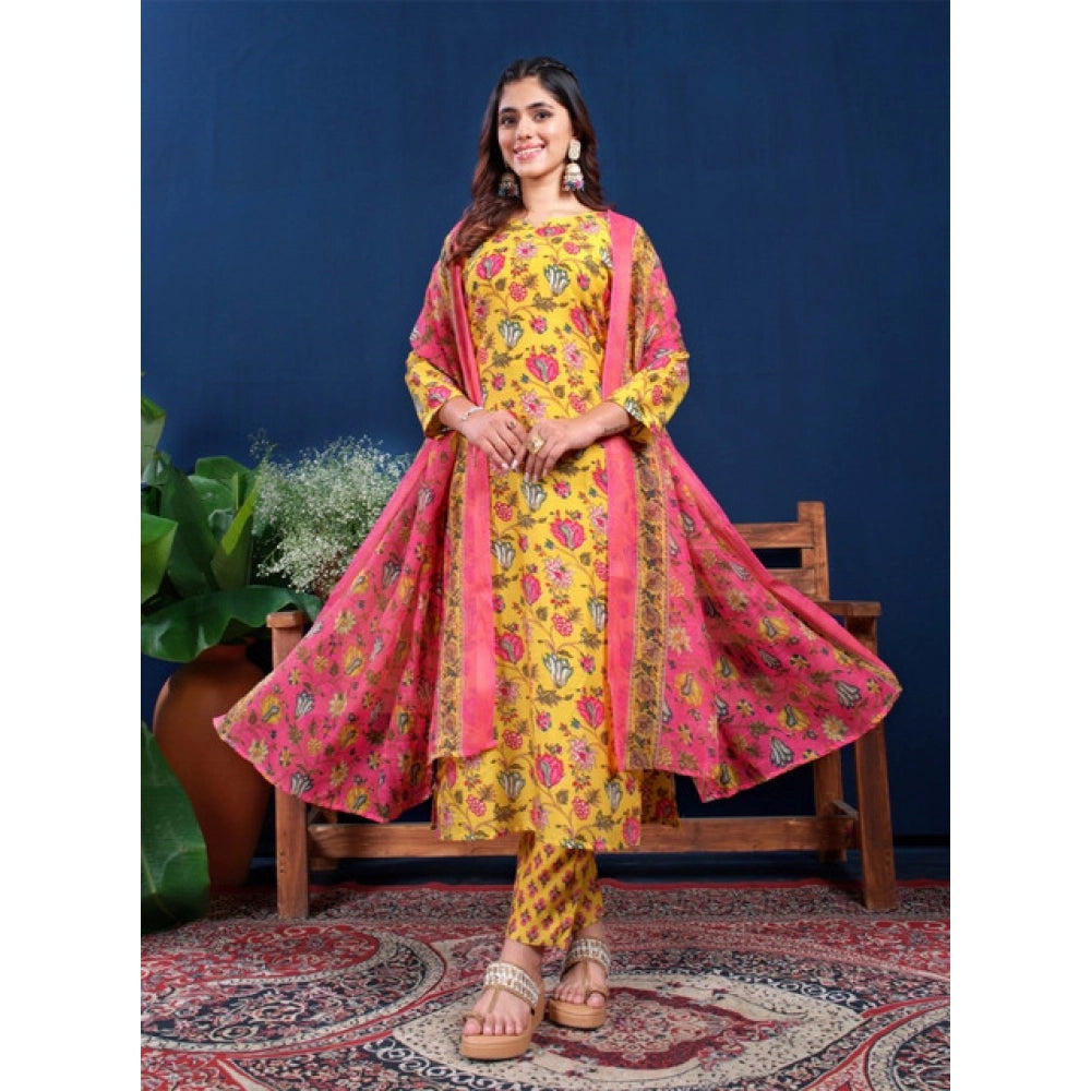 Yellow cotton blend printed kurti with pant dupatta set, below knee length, round neck, 3/4th sleeves on display stand